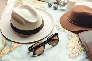 Journey vacation holiday concept map hat summer trip traveler vintage photo