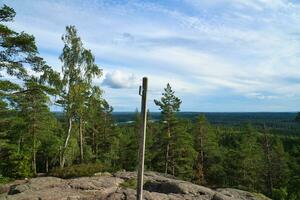 Skurugata in Smaland, Sweden. Viewpoint with view over forests in Scandinavia. photo