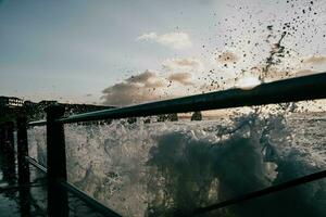 a view of the ocean from a railing photo