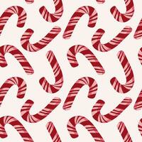 Vector red candy canes seamless pattern. Christmas design.