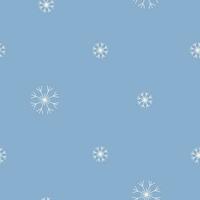 Snowflakes seamless pattern. White winter snowflakes on blue background. New Year and Christmas print design. vector