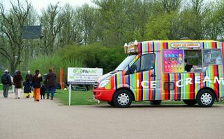 Beautiful view of People Walking and Visiting the Willen Lake of Milton Keynes City of England UK, Image Captured on April 9th, 2023 photo