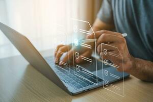 Electronic signature or checking list, Business man using pen checking digital virtual screen document, document management, paperless office, signing business contract, electronic document system. photo