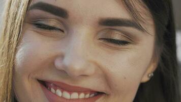 Cropped shot of a beautiful happy woman smiling video