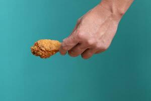 Hand Holding Food photo