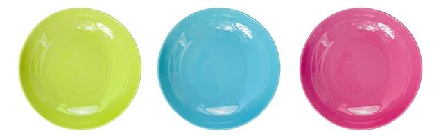 Top view of empty colorful plates isolate on white background photo