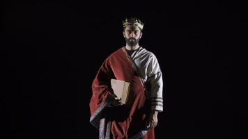 Roman Emperor. Historical reenactment. Black background. video