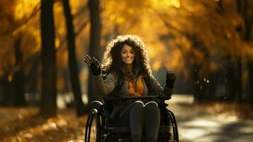 Young disabled woman with curly hair in wheelchair in autumn park. photo