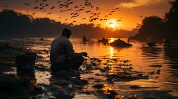 Fishermen fishing in golden light in Mekong River ,Thailand. photo