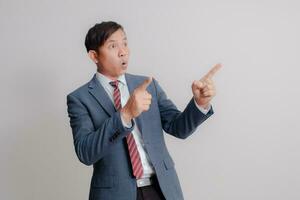 Businessman wearing a suit on a white background photo