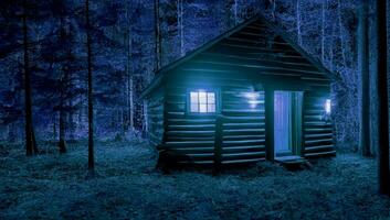 cabina en el bosque Relajado temperamental con resplandor luces desde dentro foto