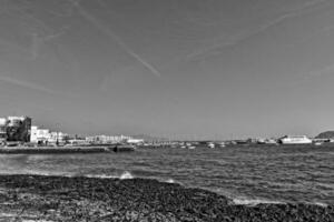 view of the beach and blue ocean on the Canary Island Fuerteventura in Spain photo