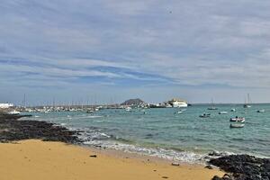 view of the beach and blue ocean on the Canary Island Fuerteventura in Spain photo