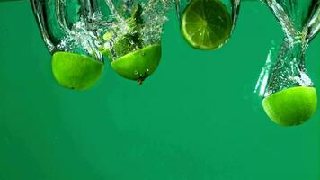 Lime pieces fall under water. Filmed on a highspeed camera at 1000 fps. High quality FullHD footage video