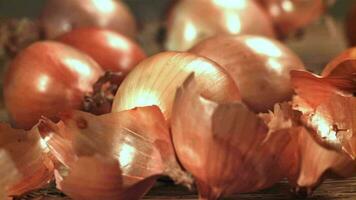 Fresh onions with flying shells. Filmed on a highspeed camera at 1000 fps. High quality FullHD footage video