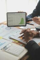 Team of business people working together in the meeting room office, teamwork background charts and graphs banner, double exposure successful teamwork,business planning concept. photo