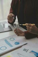 Inspiration. hand hold light bulb for good idea. brainstorming creative idea. photo