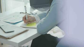 Young asian business woman working on project plan using sticky papers notes on glass wall, people meeting to share idea, Business design planning concepts. video