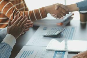 Business handshake for teamwork of business merger and acquisition,successful negotiate,hand shake,two businessman shake hand with partner to celebration partnership and business deal concept photo