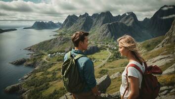 Couple family traveling together on cliff edge in Norway man and woman lifestyle concept summer vacations outdoor aerial view Lofoten islands Reinebringen mountain top. Ai Generated photo