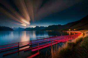 a long pier with red lights on it at night. AI-Generated photo