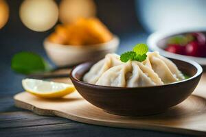 the dumplings are served in a bowl with a slice of lemon and a bowl of rice. AI-Generated photo