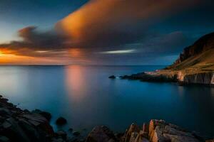 un puesta de sol terminado el Oceano con rocas y rocas generado por ai foto