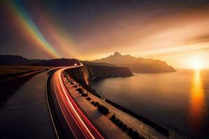 un arco iris terminado el Oceano y un la carretera. generado por ai foto