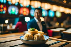 a man in a suit sitting at a table with a bowl of dumplings. AI-Generated photo