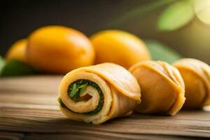 Tres rollos de queso con Espinacas en un de madera mesa. generado por ai foto