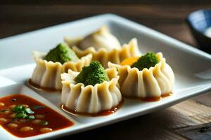 a plate with dumplings and sauce on it. AI-Generated photo