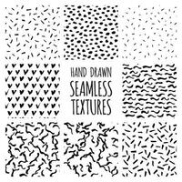 hand drawn seamless textures set vector