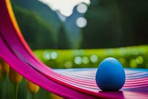 a blue egg sitting on a colorful ribbon. AI-Generated photo