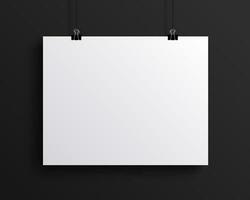 blank white paper hanging on a black wall mockup vector