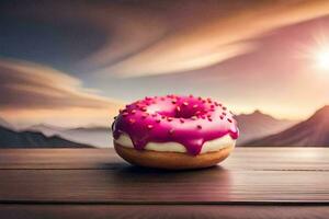 a pink donut with frosting on top sits on a table in front of a mountain. AI-Generated photo