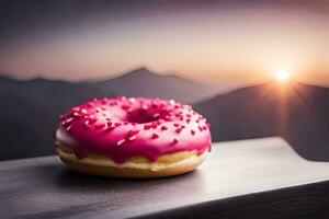 a pink doughnut sits on a table with a mountain in the background. AI-Generated photo