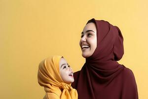 Portrait of muslim mother and daughter smiling over yellow background AI Generated photo