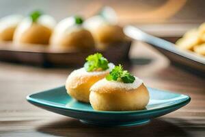 small bread rolls with cheese and parsley on a blue plate. AI-Generated photo