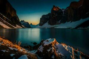 el montañas son reflejado en el agua a puesta de sol. generado por ai foto