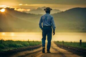 un hombre en un sombrero camina abajo un suciedad la carretera a puesta de sol. generado por ai foto