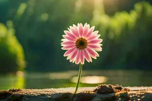 a single pink flower stands out from the ground in front of a lake. AI-Generated photo