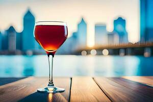 un vaso de vino en un mesa en frente de un ciudad horizonte. generado por ai foto