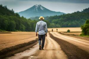 a man walking down a dirt road with a mountain in the background. AI-Generated photo
