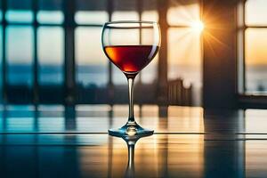 a glass of red wine on a table in front of the sun. AI-Generated photo