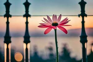 a single pink flower is standing in front of a fence. AI-Generated photo