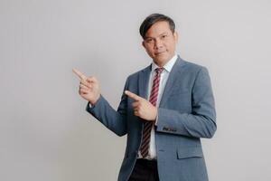 Businessman wearing a suit on a white background photo