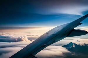 an airplane wing is seen flying over clouds. AI-Generated photo