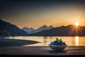 blueberries in a bowl on a table in front of a lake. AI-Generated photo