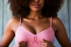 rosado octubre - mujer vistiendo rosado blusa con arco, símbolo de pecho cáncer conciencia. internacional conciencia movimiento para el temprano detección de pecho cáncer, rosado octubre - generado por ai foto