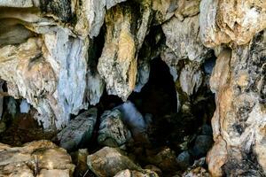 the cave is filled with rocks photo